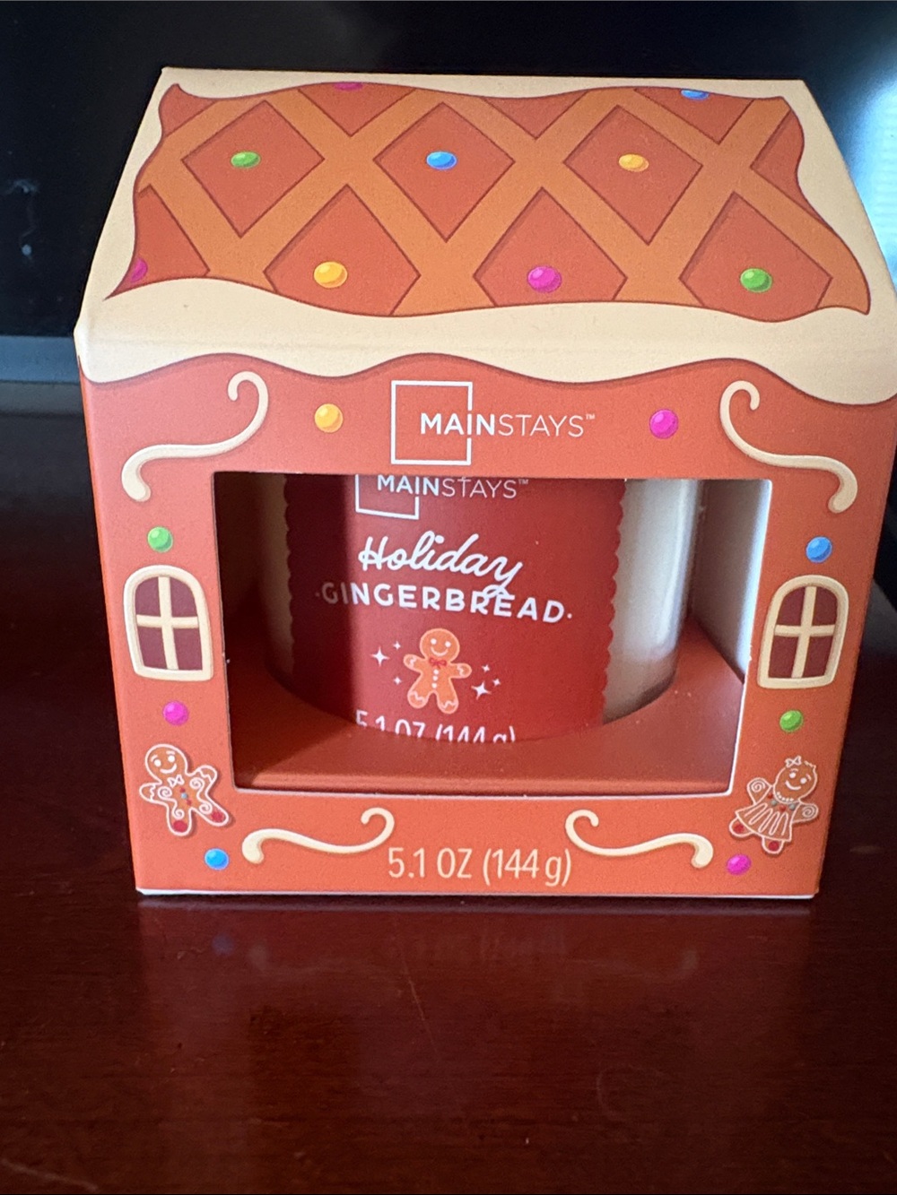 Mainstays Holiday Gingerbread Candle in Orange Packaging